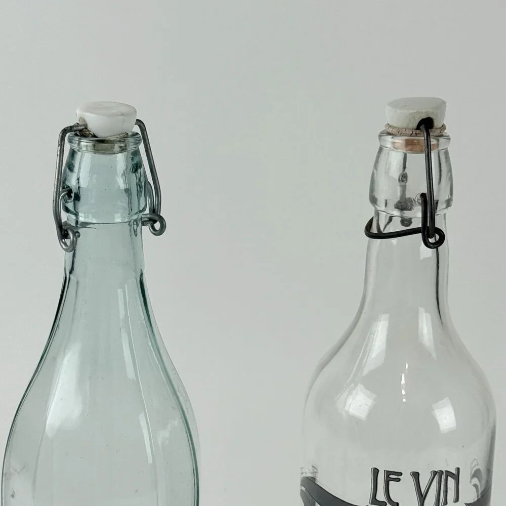 Art Nouveau Le Vin Wine Bottle Set Ceramic Topper Glass Pair 12.5”